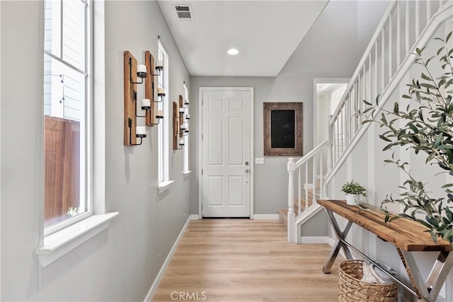 9180 Araujo Ct, Atascadero, CA 93422 - foyer featuring light wood-type flooring, stairs, and recessed lighting