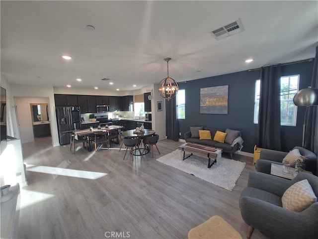 12801 N Watt Ln Unit A, Sylmar, CA 91342 - living area with a chandelier, light wood-style flooring, and recessed lighting