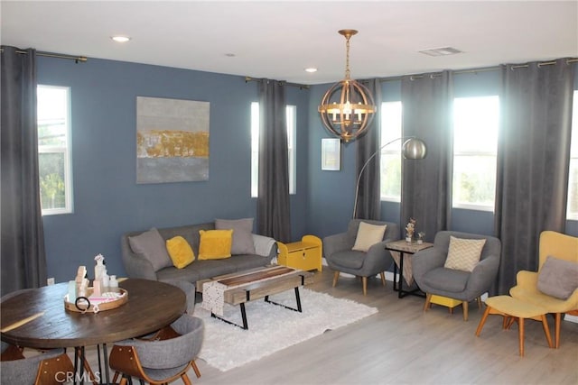 12801 N Watt Ln Unit A, Sylmar, CA 91342 - living room featuring a chandelier, light wood-style floors, and recessed lighting