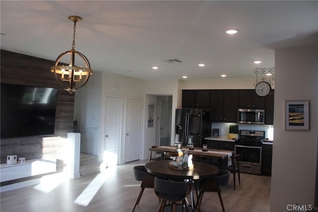 12801 N Watt Ln Unit A, Sylmar, CA 91342 - dining room with a chandelier, light wood-type flooring, and recessed lighting