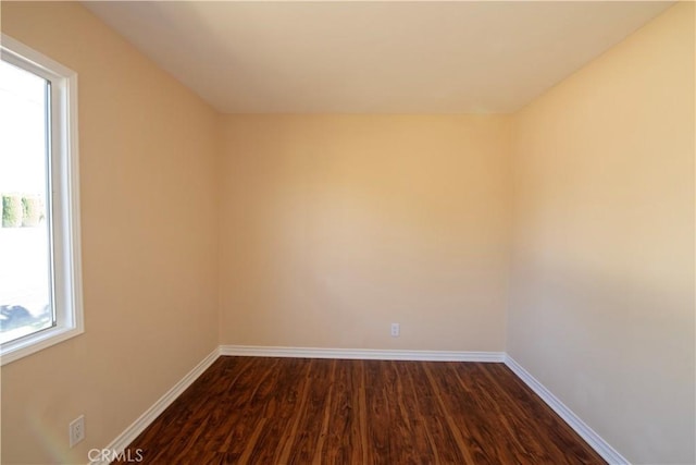 10345 Encino Ave, Granada Hills, CA 91344 - empty room featuring dark wood-type flooring and baseboards