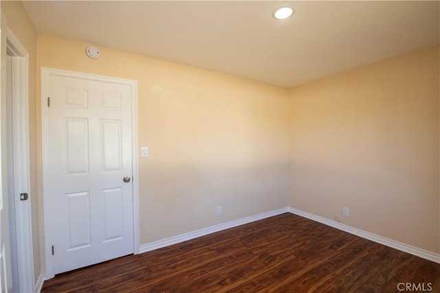 10345 Encino Ave, Granada Hills, CA 91344 - unfurnished room with dark wood-style flooring, recessed lighting, and a smoke detector