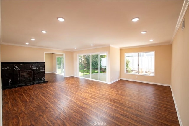 10345 Encino Ave, Granada Hills, CA 91344 - unfurnished living room with dark wood-style floors, crown molding, recessed lighting, and a fireplace