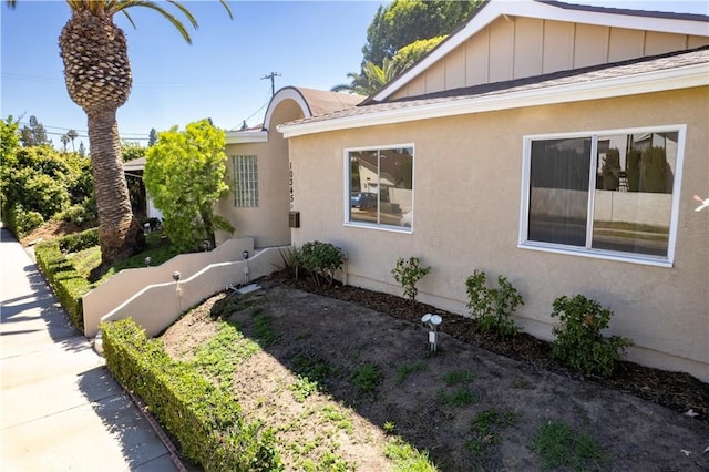 10345 Encino Ave, Granada Hills, CA 91344 - view of home's exterior with board and batten siding