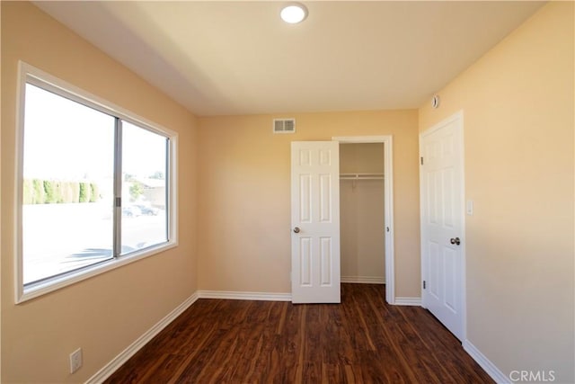 10345 Encino Ave, Granada Hills, CA 91344 - unfurnished bedroom featuring dark wood finished floors, a closet, and recessed lighting