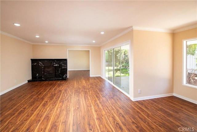 10345 Encino Ave, Granada Hills, CA 91344 - unfurnished living room with plenty of natural light, wood finished floors, a fireplace, recessed lighting, and ornamental molding