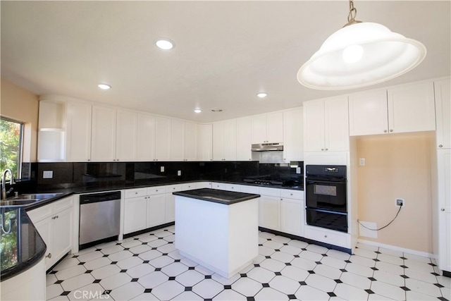 10345 Encino Ave, Granada Hills, CA 91344 - kitchen featuring stainless steel dishwasher, black oven, a warming drawer, under cabinet range hood, and dark countertops