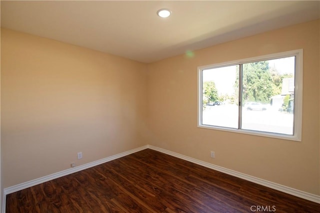 10345 Encino Ave, Granada Hills, CA 91344 - spare room featuring dark wood-style floors and recessed lighting