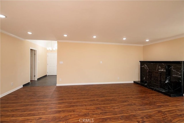 10345 Encino Ave, Granada Hills, CA 91344 - unfurnished living room featuring dark wood-style floors, a chandelier, recessed lighting, ornamental molding, and a fireplace