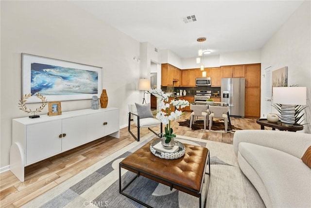 505 Falling Leaf, Monrovia, CA 91016 - living room featuring light wood-style flooring and baseboards