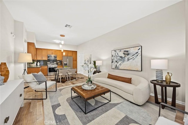 505 Falling Leaf, Monrovia, CA 91016 - living room featuring light wood-type flooring and baseboards