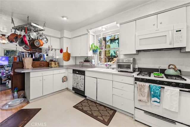 23034 Cedar Way, Crestline, CA 92325 - kitchen featuring white appliances, light countertops, and white cabinetry