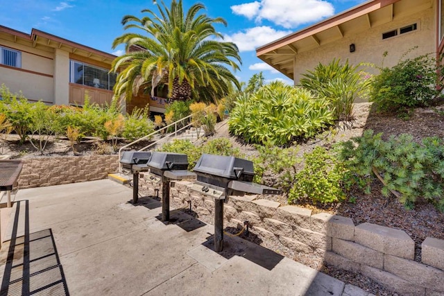 6820 Hyde Park Dr Unit A, San Diego, CA 92119 - view of property's community with an outdoor kitchen and a patio