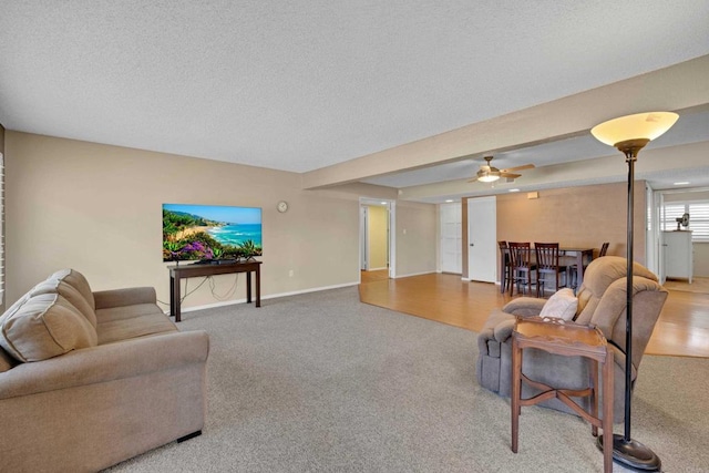 6820 Hyde Park Dr Unit A, San Diego, CA 92119 - carpeted living room featuring ceiling fan and a textured ceiling