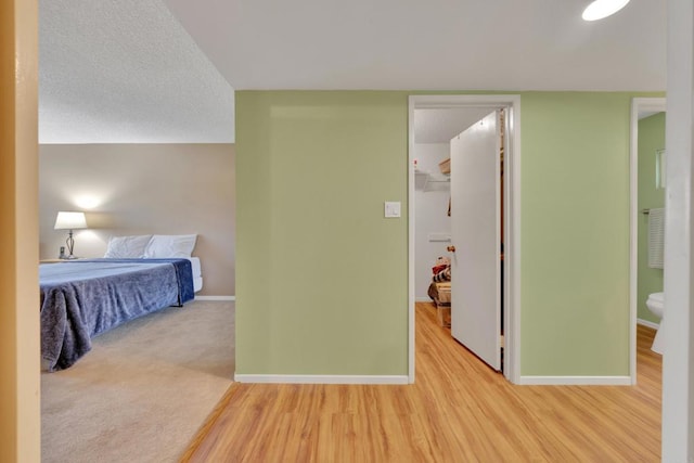 6820 Hyde Park Dr Unit A, San Diego, CA 92119 - bedroom featuring a spacious closet and wood finished floors