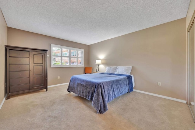 6820 Hyde Park Dr Unit A, San Diego, CA 92119 - bedroom featuring a textured ceiling and light carpet