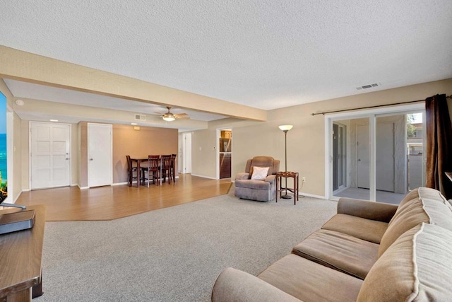 6820 Hyde Park Dr Unit A, San Diego, CA 92119 - living room with carpet, a textured ceiling, and ceiling fan