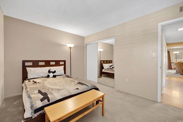 6820 Hyde Park Dr Unit A, San Diego, CA 92119 - carpeted bedroom featuring a textured ceiling