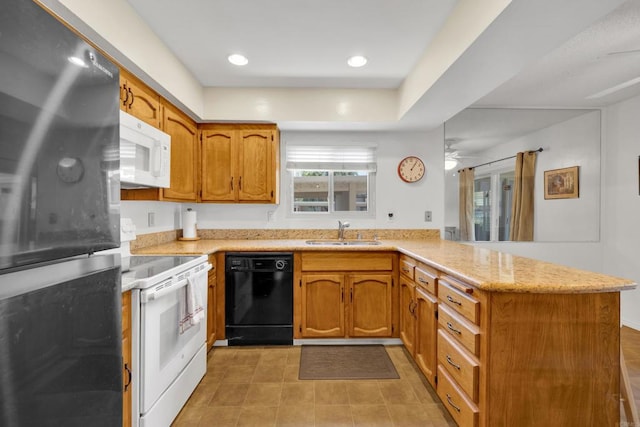 6820 Hyde Park Dr Unit A, San Diego, CA 92119 - kitchen with white appliances, a peninsula, a ceiling fan, brown cabinets, and recessed lighting