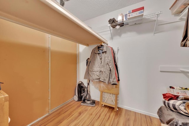 6820 Hyde Park Dr Unit A, San Diego, CA 92119 - spacious closet featuring light wood finished floors