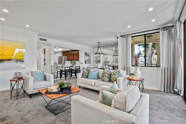 120 The Unit 210, Redondo Beach, CA 90277 - living room featuring ornamental molding, recessed lighting, and light carpet