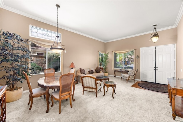 14067 Glendale Ct, Rancho Cucamonga, CA 91739 - dining room featuring carpet flooring, crown molding, and healthy amount of natural light