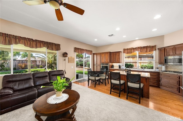 14067 Glendale Ct, Rancho Cucamonga, CA 91739 - living area with a ceiling fan, recessed lighting, and light wood finished floors