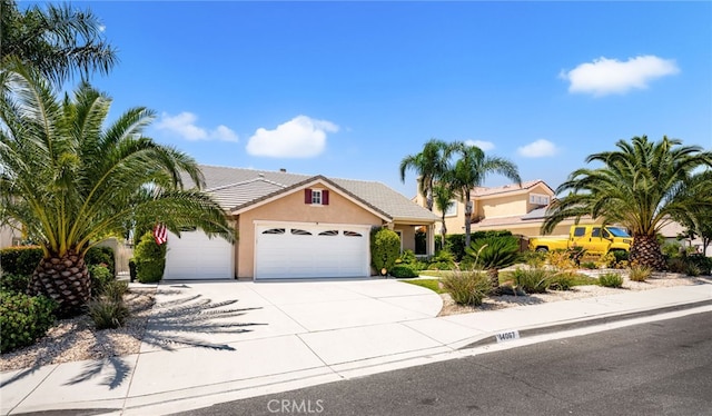14067 Glendale Ct, Rancho Cucamonga, CA 91739 - view of front of property featuring an attached garage, stucco siding, concrete driveway, and a tiled roof
