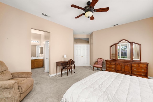 14067 Glendale Ct, Rancho Cucamonga, CA 91739 - bedroom featuring light colored carpet, ensuite bath, a closet, and ceiling fan
