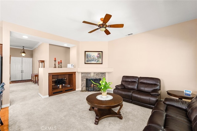 14067 Glendale Ct, Rancho Cucamonga, CA 91739 - carpeted living room featuring ceiling fan, crown molding, a premium fireplace, and recessed lighting