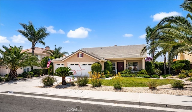 14067 Glendale Ct, Rancho Cucamonga, CA 91739 - single story home with an attached garage, driveway, stucco siding, and a tiled roof