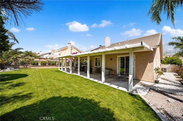 14067 Glendale Ct, Rancho Cucamonga, CA 91739 - rear view of property featuring stucco siding, a chimney, and a patio area