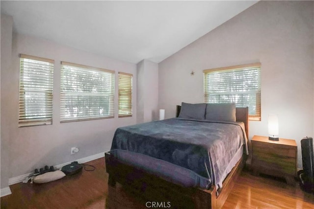 259 N Holliston Ave Unit 1, Pasadena, CA 91106 - bedroom featuring multiple windows, wood finished floors, and vaulted ceiling