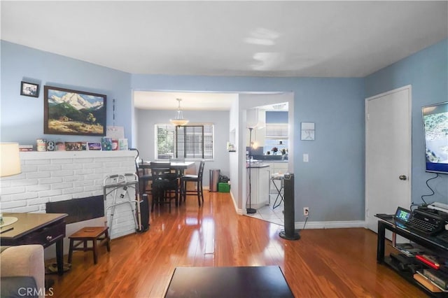 259 N Holliston Ave Unit 1, Pasadena, CA 91106 - living area with wood finished floors and a fireplace