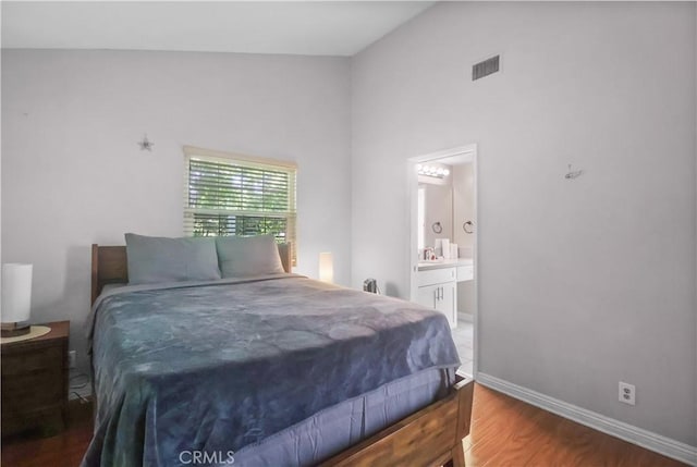 259 N Holliston Ave Unit 1, Pasadena, CA 91106 - bedroom featuring wood finished floors, high vaulted ceiling, and ensuite bath