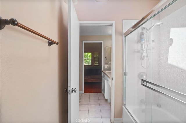 259 N Holliston Ave Unit 1, Pasadena, CA 91106 - full bathroom with combined bath / shower with glass door and tile patterned floors