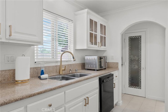 569 S Fenimore Ave, Covina, CA 91723 - kitchen with black dishwasher, ornamental molding, glass insert cabinets, white cabinetry, and light tile patterned flooring