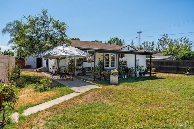 569 S Fenimore Ave, Covina, CA 91723 - back of house with a patio, french doors, and a fenced backyard