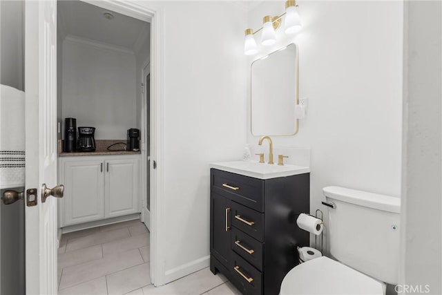 569 S Fenimore Ave, Covina, CA 91723 - bathroom with crown molding, vanity, and tile patterned flooring