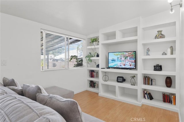 569 S Fenimore Ave, Covina, CA 91723 - living area featuring wood finished floors and built in features