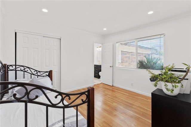 569 S Fenimore Ave, Covina, CA 91723 - bedroom featuring ornamental molding, light wood-type flooring, a closet, and recessed lighting