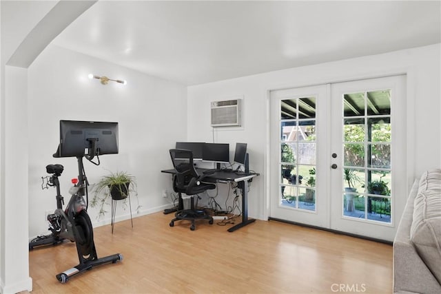569 S Fenimore Ave, Covina, CA 91723 - office space with french doors, an AC wall unit, and wood finished floors