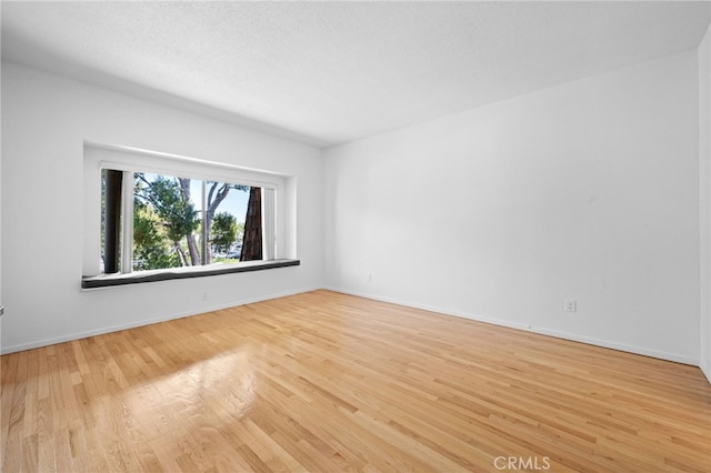 4320 Glencoe Ave Unit 2, Marina Del Rey, CA 90292 - empty room featuring wood finished floors and baseboards