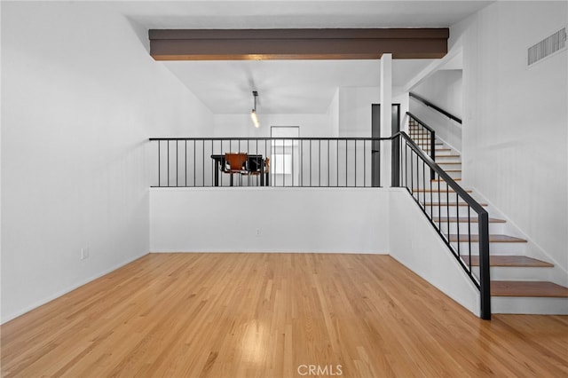 4320 Glencoe Ave Unit 2, Marina Del Rey, CA 90292 - staircase with wood finished floors and beam ceiling