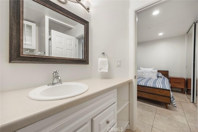 1068 Calle Del Cerro Unit 1521, San Clemente, CA 92672 - bathroom with vanity, ensuite bathroom, tile patterned floors, and recessed lighting