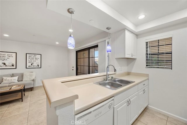 1068 Calle Del Cerro Unit 1521, San Clemente, CA 92672 - kitchen featuring dishwasher, white cabinets, a peninsula, light tile patterned floors, and hanging light fixtures