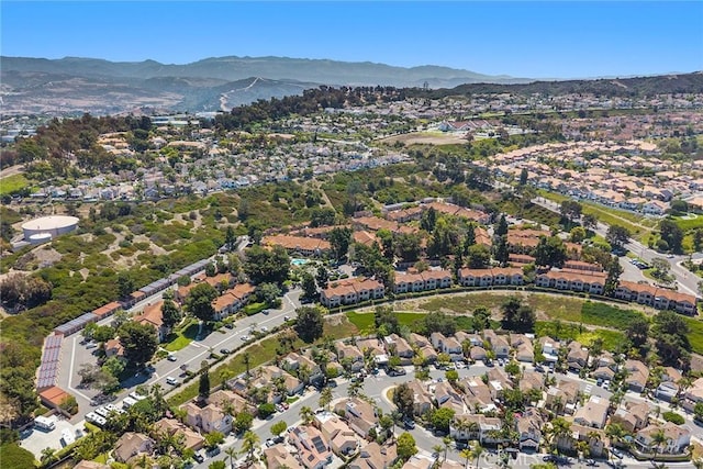 1068 Calle Del Cerro Unit 1521, San Clemente, CA 92672 - aerial overview of property's location with a mountain backdrop and nearby suburban area