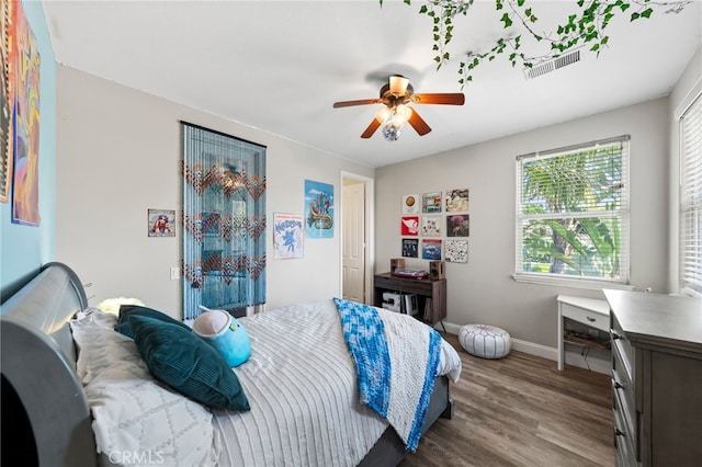 982 Camino Del Arroyo Dr Unit 49, San Marcos, CA 92078 - bedroom with wood finished floors and ceiling fan