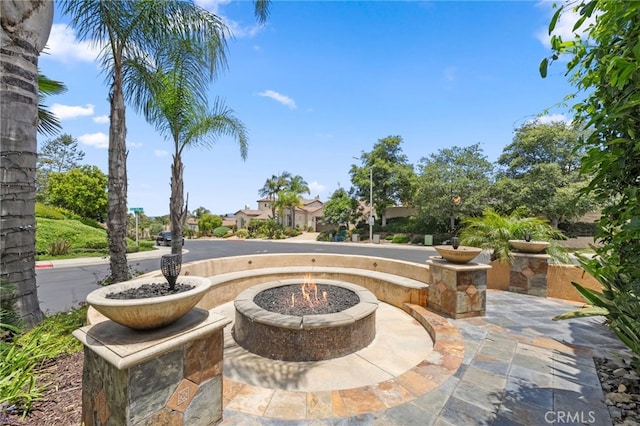 982 Camino Del Arroyo Dr Unit 49, San Marcos, CA 92078 - view of patio / terrace with a fire pit