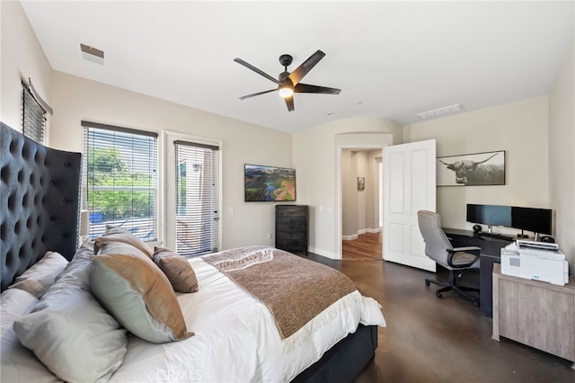 982 Camino Del Arroyo Dr Unit 49, San Marcos, CA 92078 - bedroom featuring a desk, finished concrete floors, ceiling fan, and access to exterior